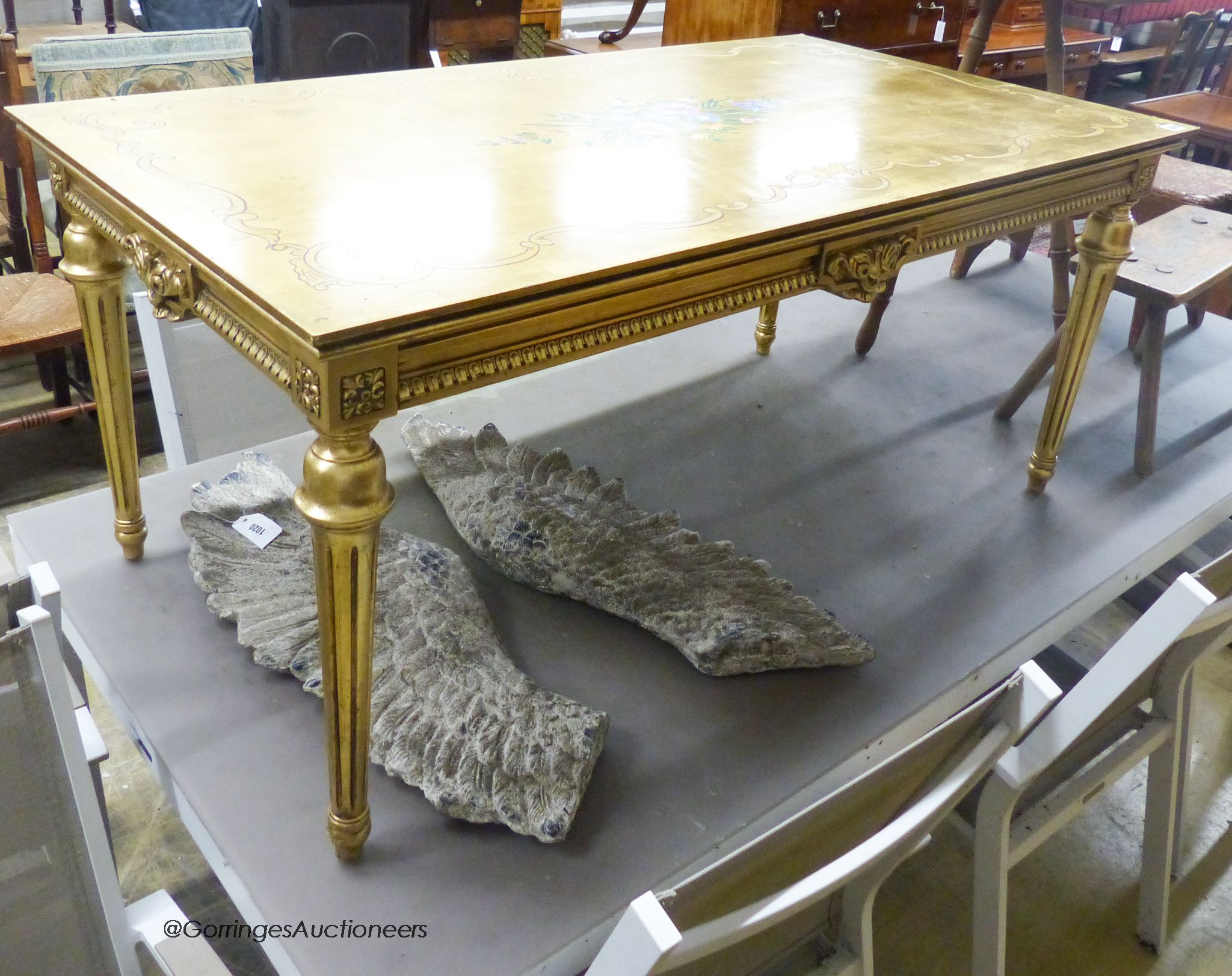 A rectangular painted gilt coffee table, width 125cm, depth 67cm, height 55cm